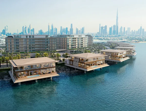 Rendered Bulgari Ocean View Residence featuring luxury waterfront residential architecture with overwater villas and city skyline.