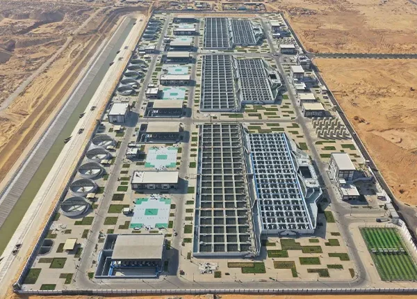 Aerial rendering of the New Delta facility in Egypt, the world’s largest wastewater and water treatment plant, with extensive treatment basins, pumping systems, and water conveyance canal in the Western Desert.