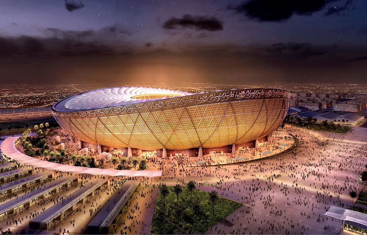 Rendered night view of Lusail Stadium in Qatar illuminated in gold, an 80,000-seat sports facilities venue designed for the FIFA World Cup and future community use.